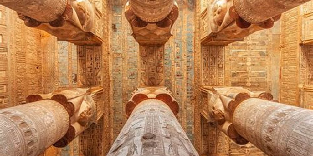 Six ancient columns decorated with intricate carvings, reliefs, and stunning drawings.