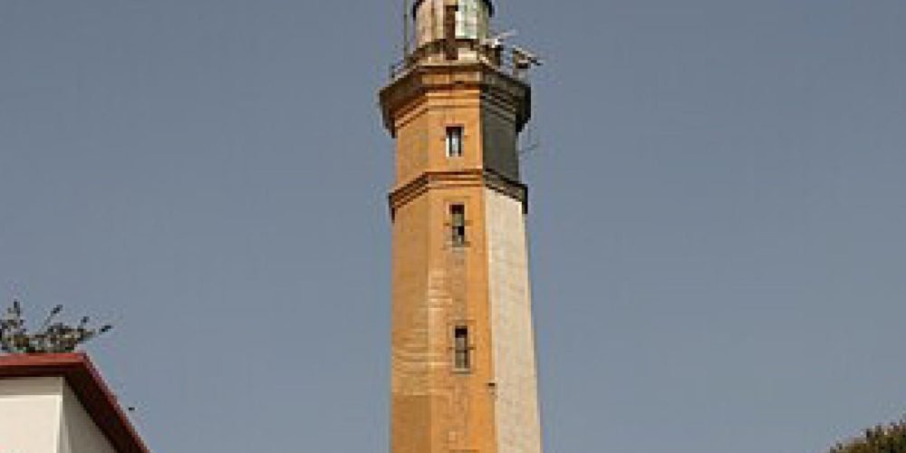 The historic Lighthouse of Port Said standing along the Mediterranean coast of Egypt.