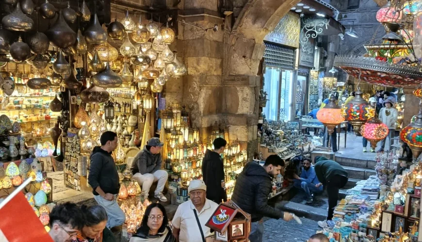 A bustling street scene in Khan El Khalili Bazaar, Cairo.