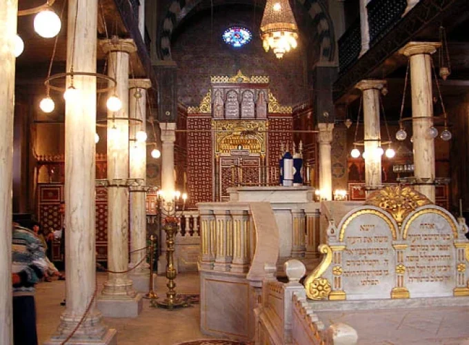 Interior view of Ibn Ezra Synagogue, showcasing its historic architecture and ornate details