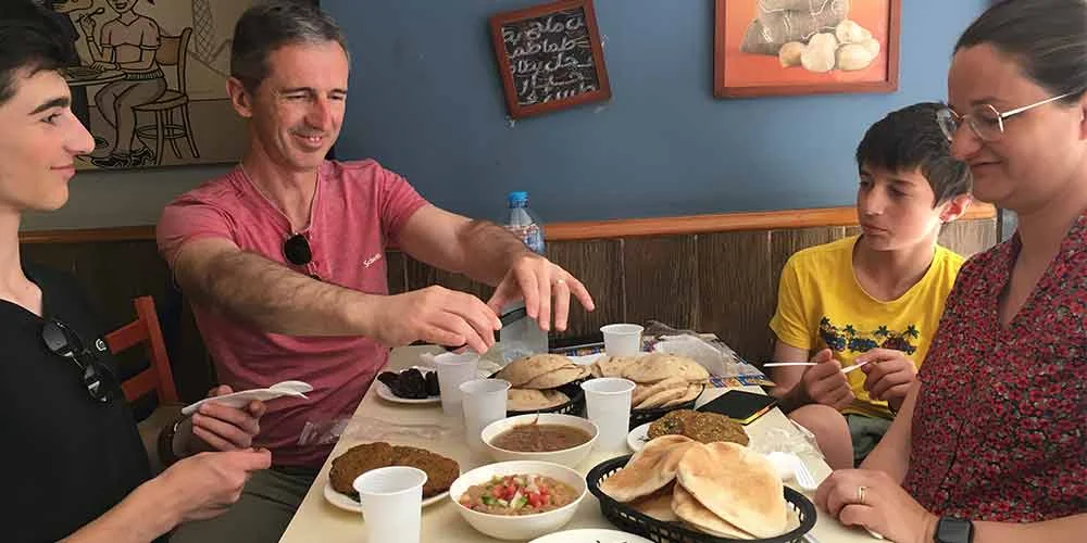 A traditional Egyptian breakfast, with dishes like falafel, ful, and fresh bread