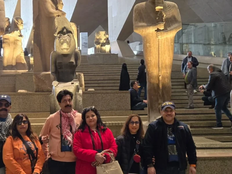 A group of friends takes a memorable photo inside the Grand Egyptian Museum (GEM)