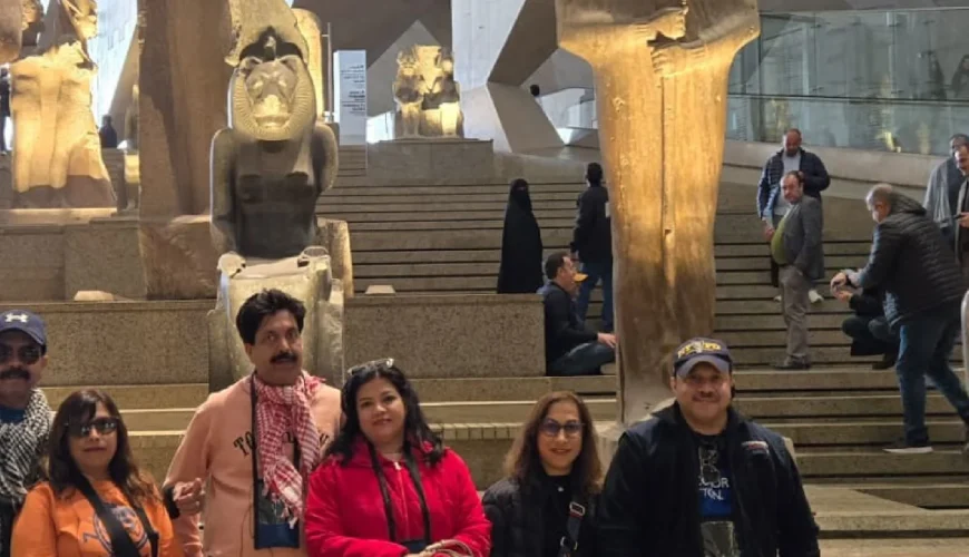 A group of friends takes a memorable photo inside the Grand Egyptian Museum (GEM)